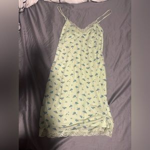 Green dress with blue flowers